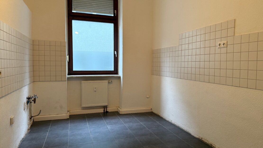 Erdgeschoss-Altbauwohnung in Bahnhofsnähe - Foto 2