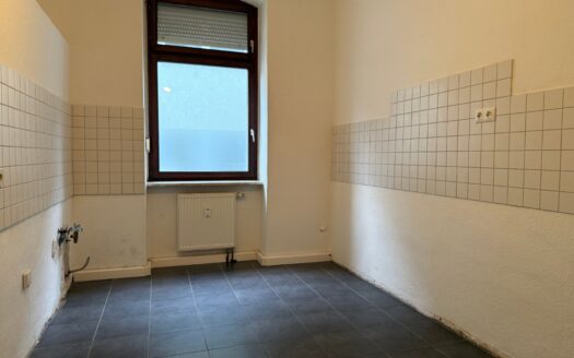 Erdgeschoss-Altbauwohnung in Bahnhofsnähe